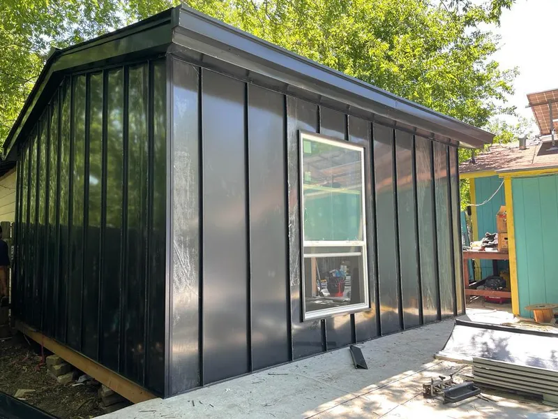 Black standing seam metal wall panels for Roof Inspection in Grand Blanc