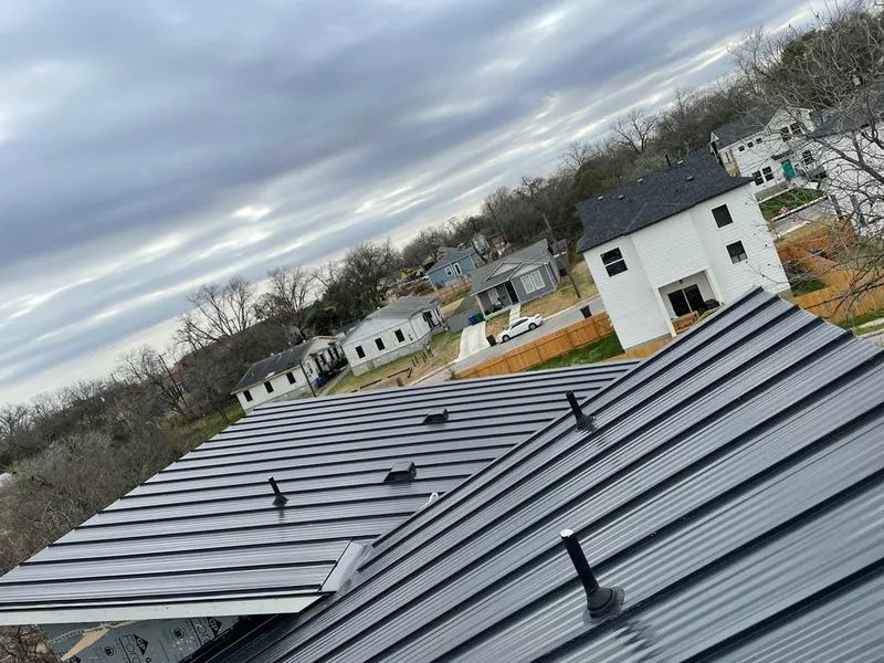Standing seam metal roof panels with vents for Skylight Repair in Grand Blanc